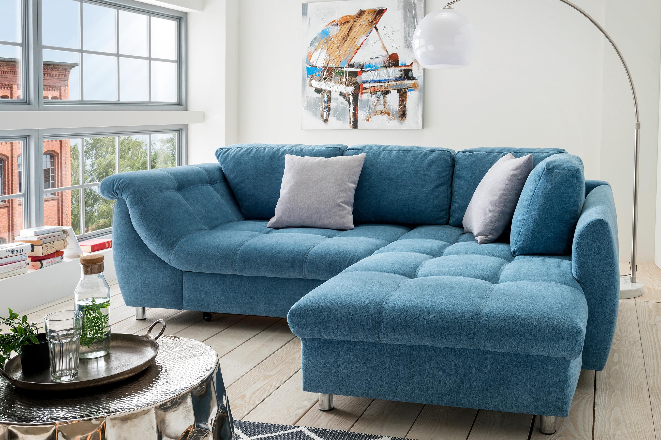 blaues Ecksofa mit Schlaffunktion
