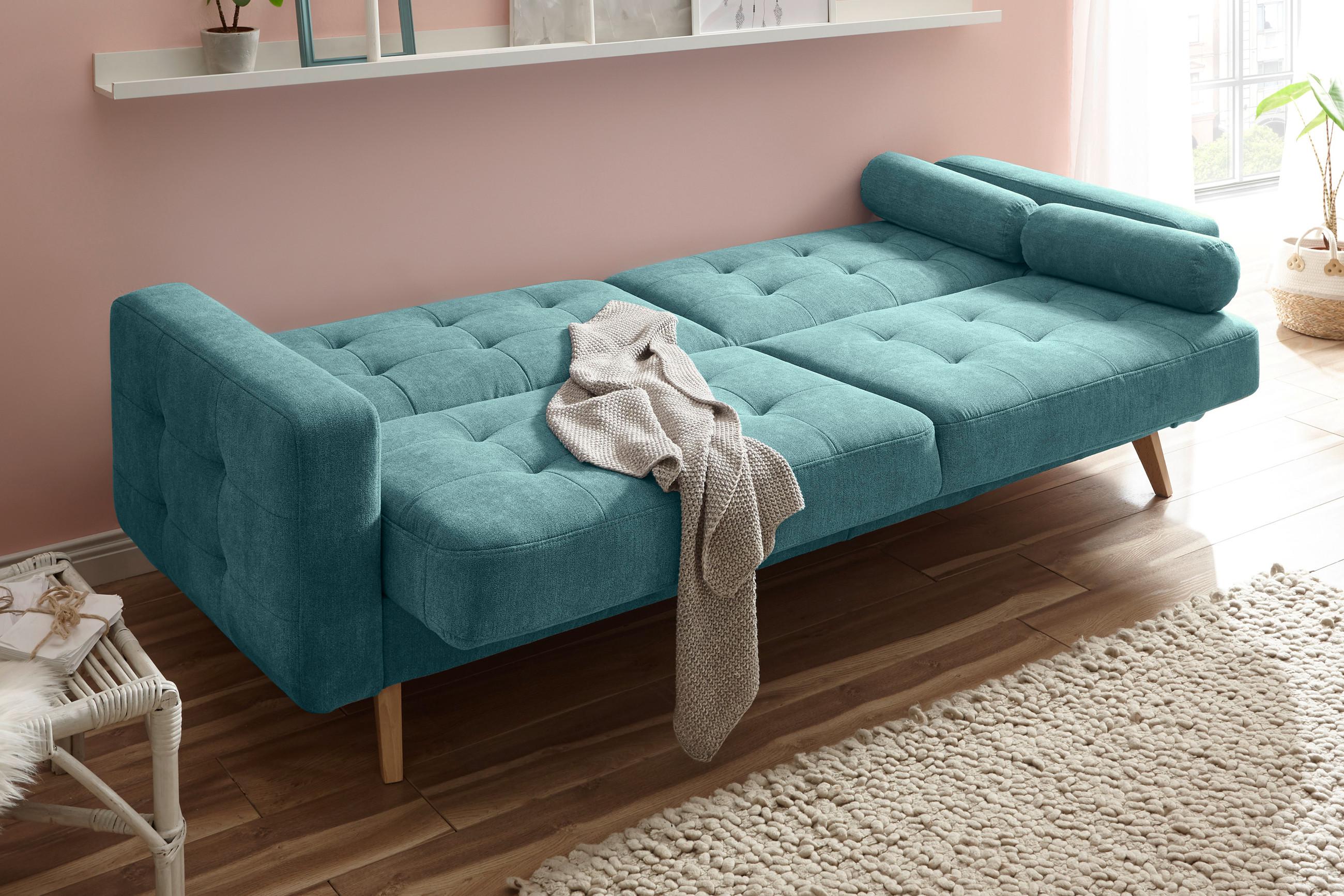 Grünes Klappsofa mit Schlaffunktion und Bettkasten