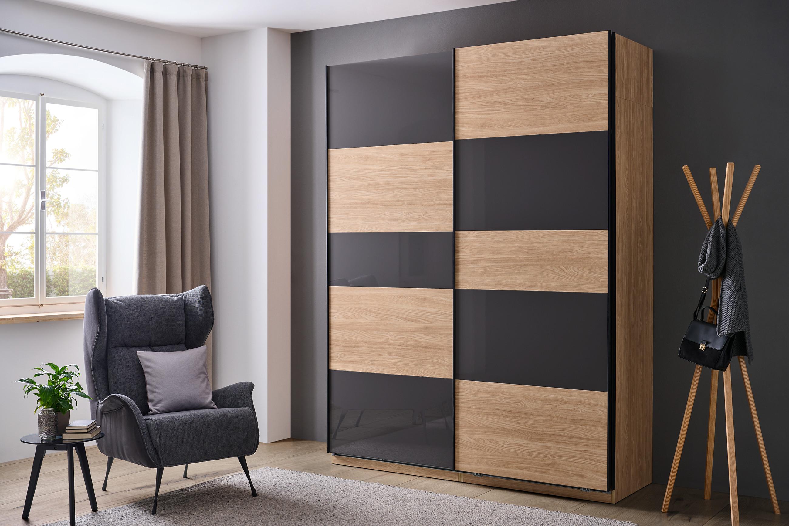 UNIT-Schwebetürenschrank in Schwarz und Holzfarbe