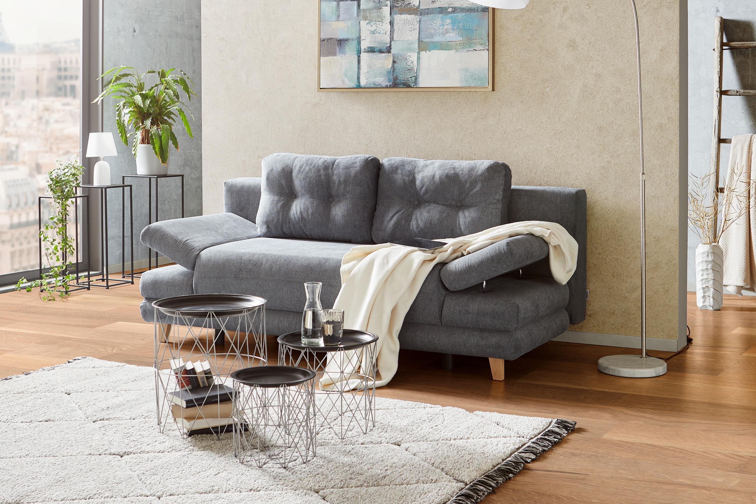 Graues Boxspringsofa mit Bettkasten