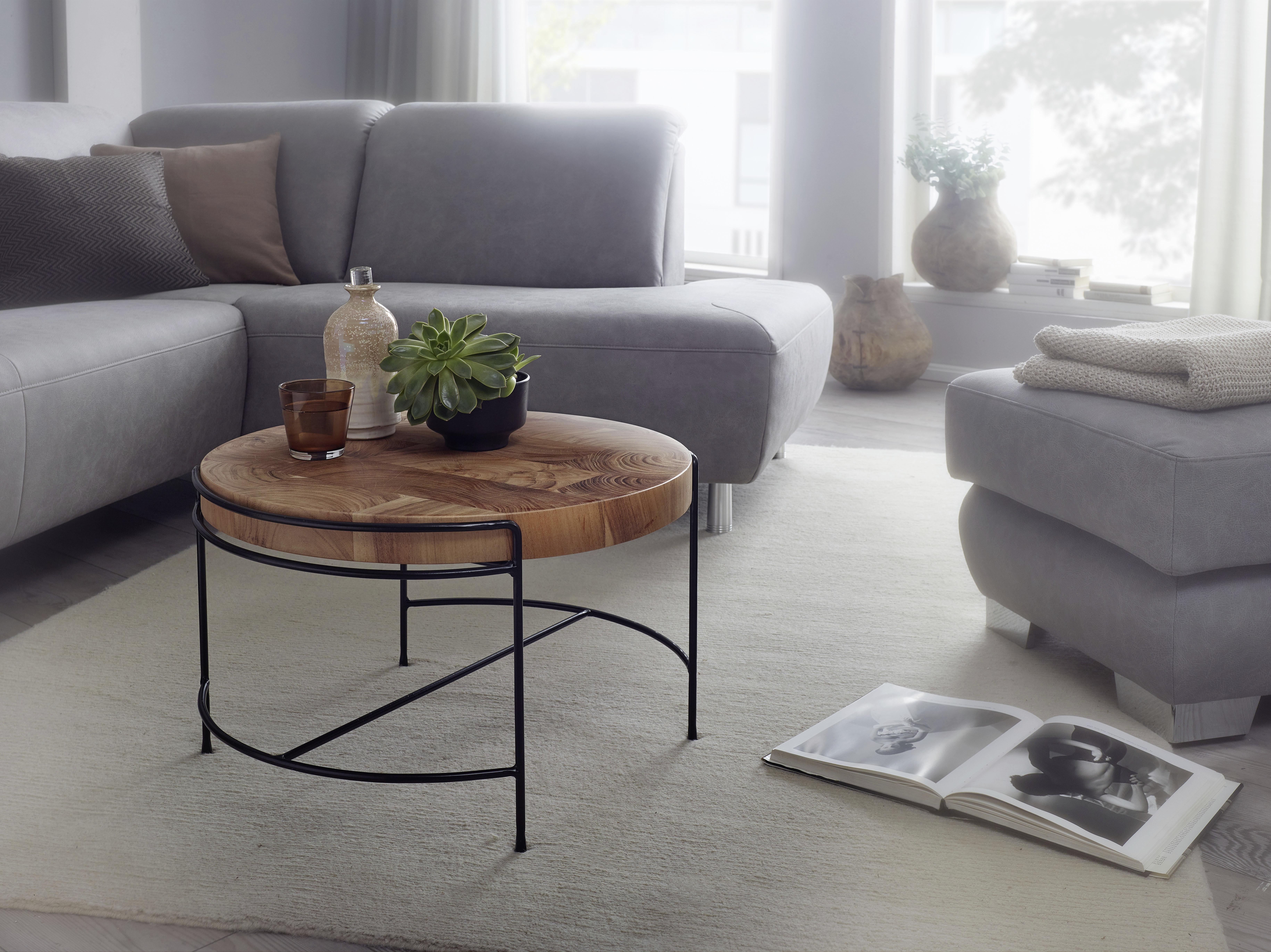 Moderner Couchtisch mit raffiniertem Gestell