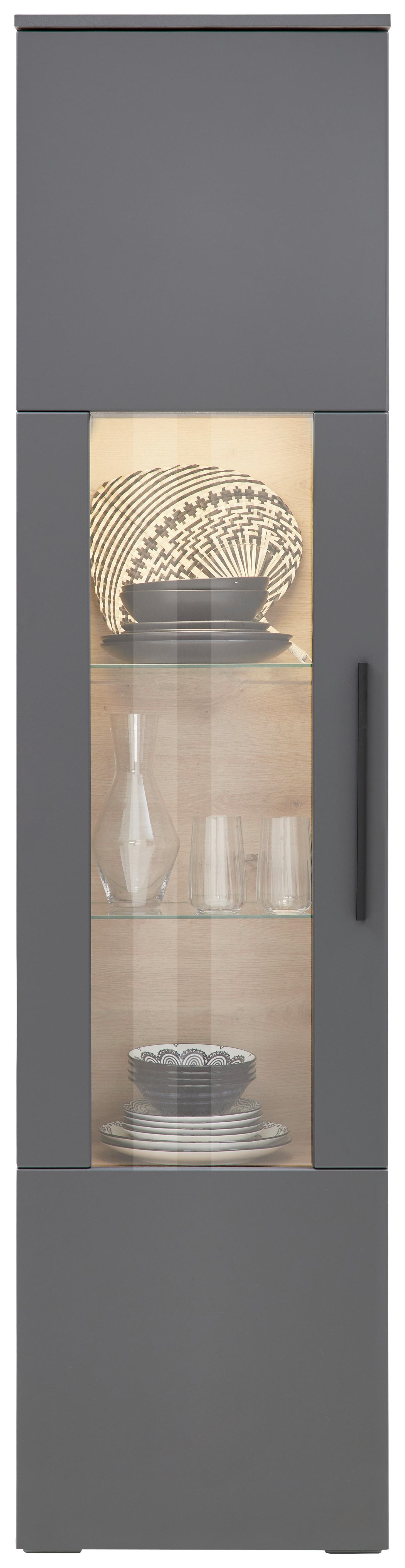 Stehvitrine mit teilverglaster Drehtür