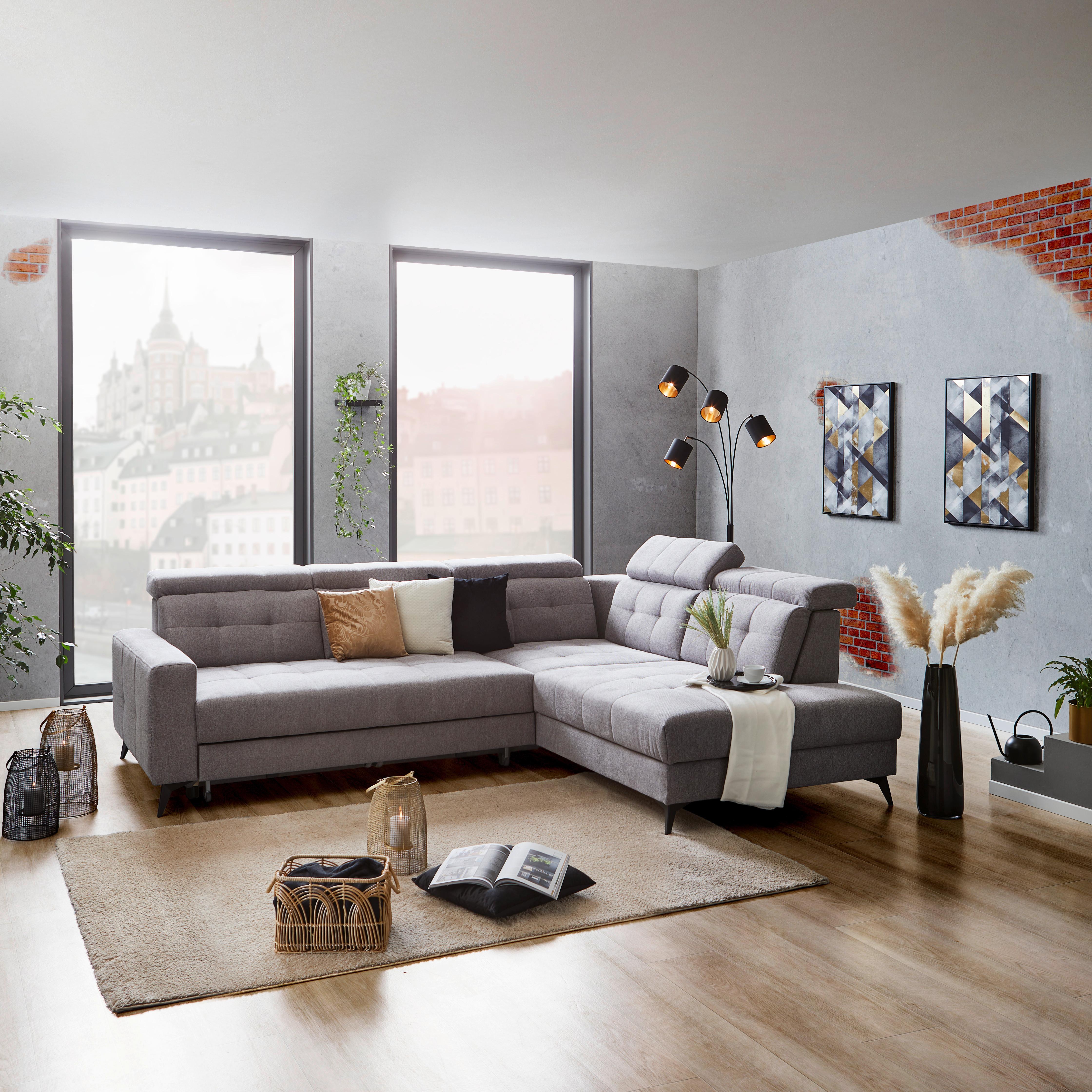 Großzügige Wohnlandschaft in Grau mit verstellbaren Kopfteilen