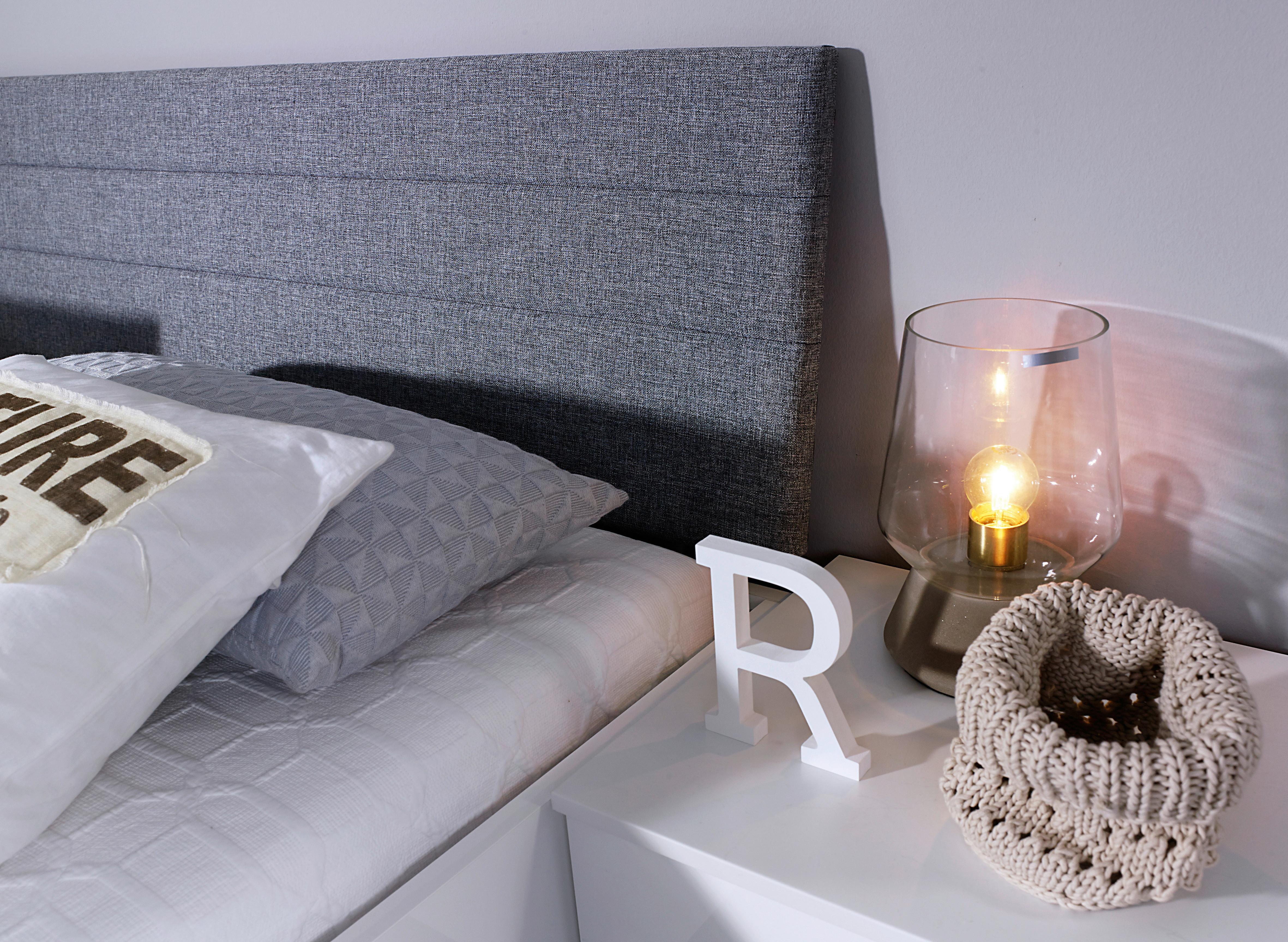 Gepolstertes Kopfteil in Grau mit Quernaht