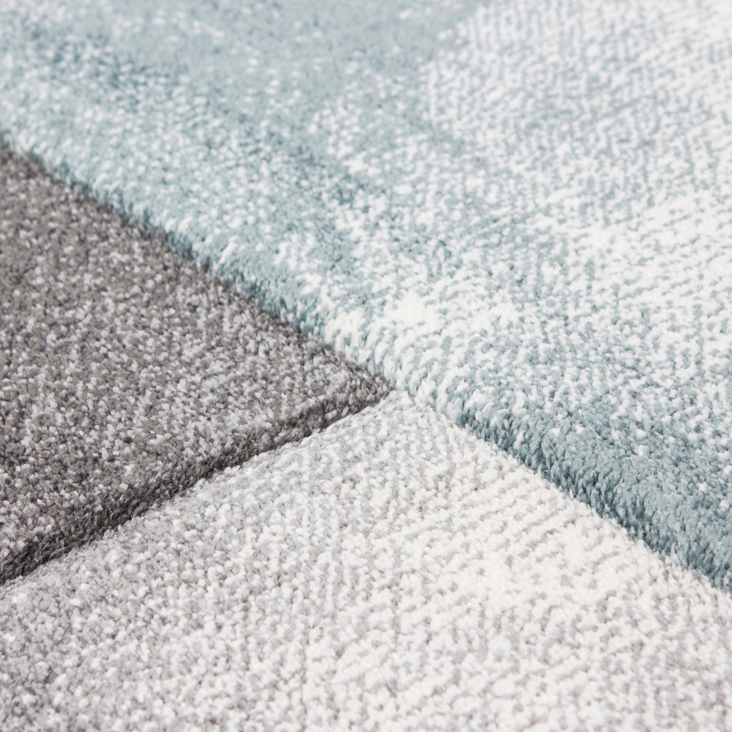 Weicher Läufer mit geometrischem Muster in Grau und Blau