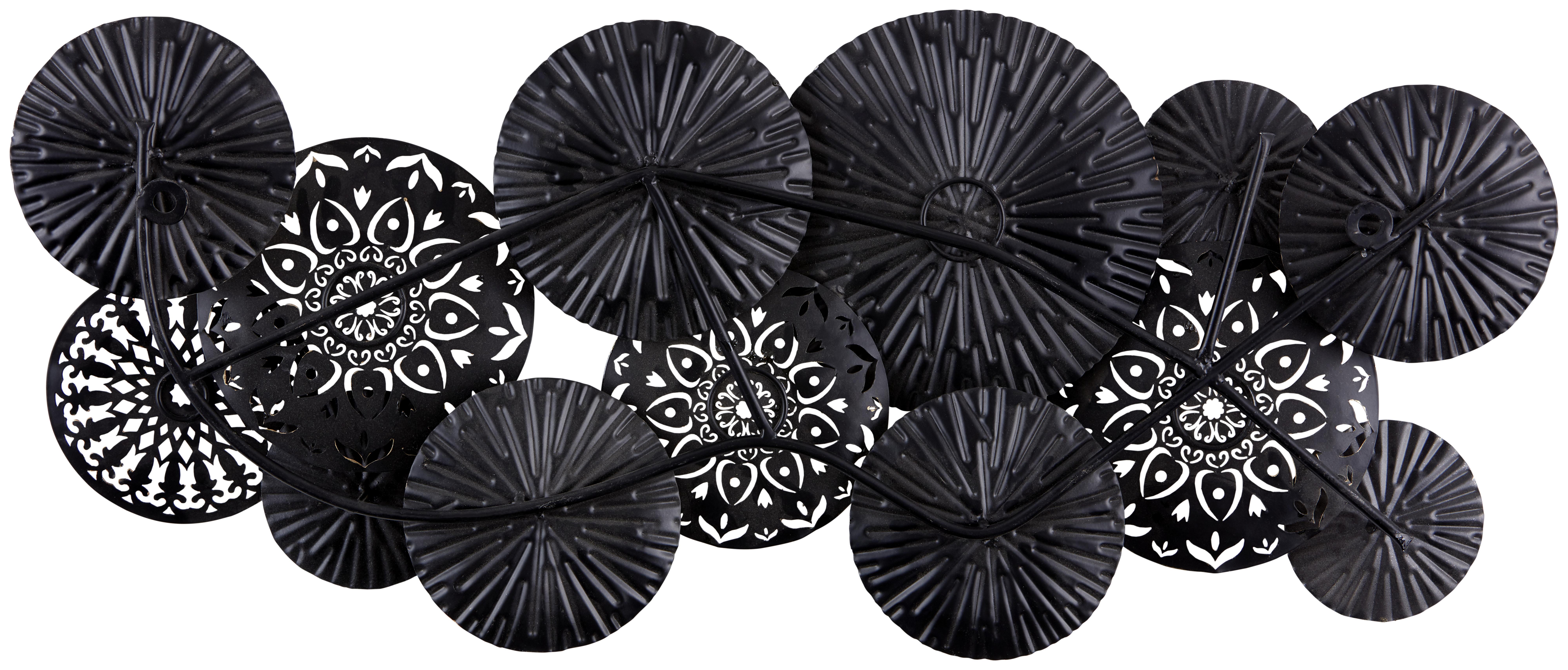 Metallene Wanddeko aus unterschiedlich strukturierten runden Metallelementen