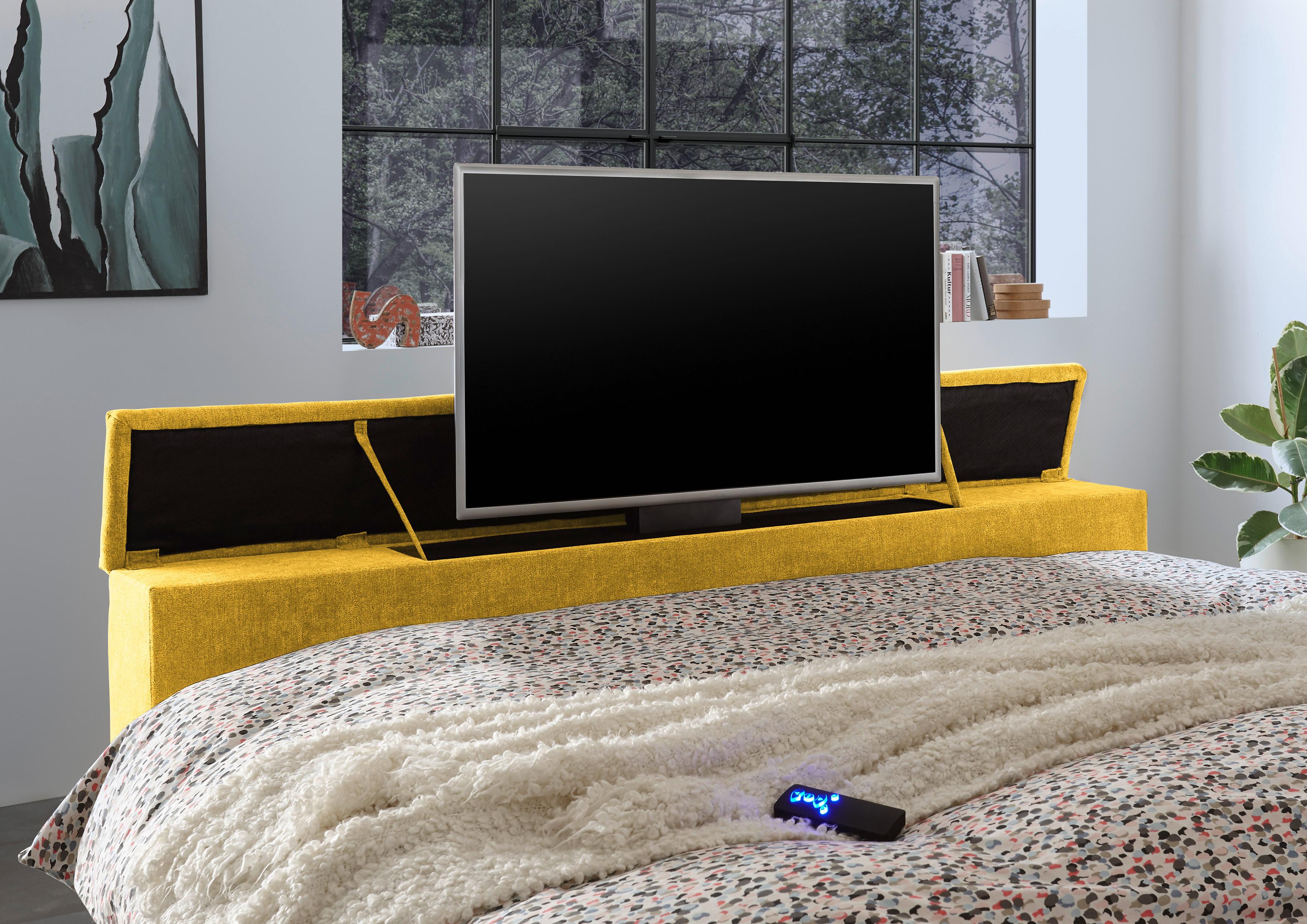 Boxspringbett mit TV-Integration