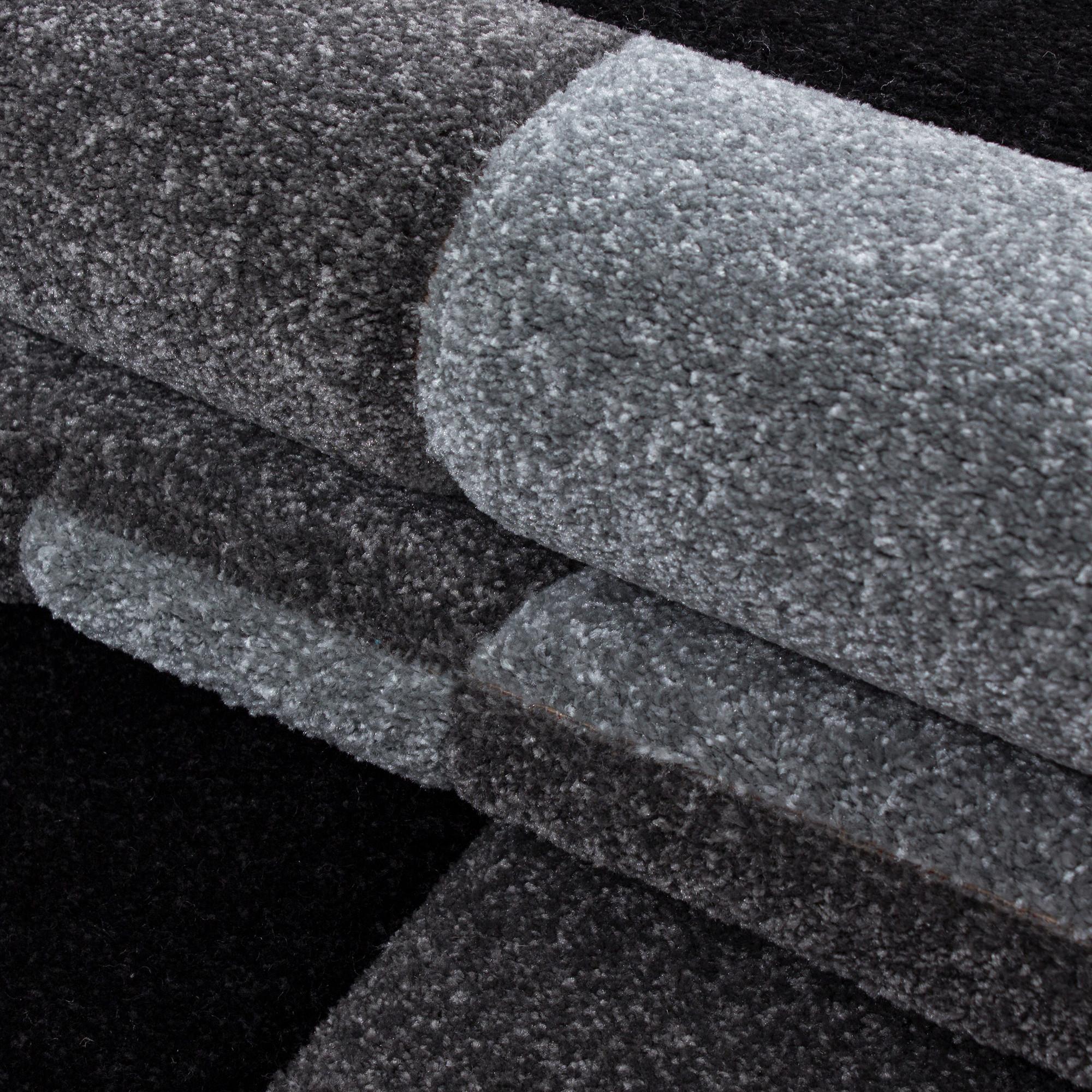 Weicher Läufer mit geometrischem Muster in Grau und Schwarz