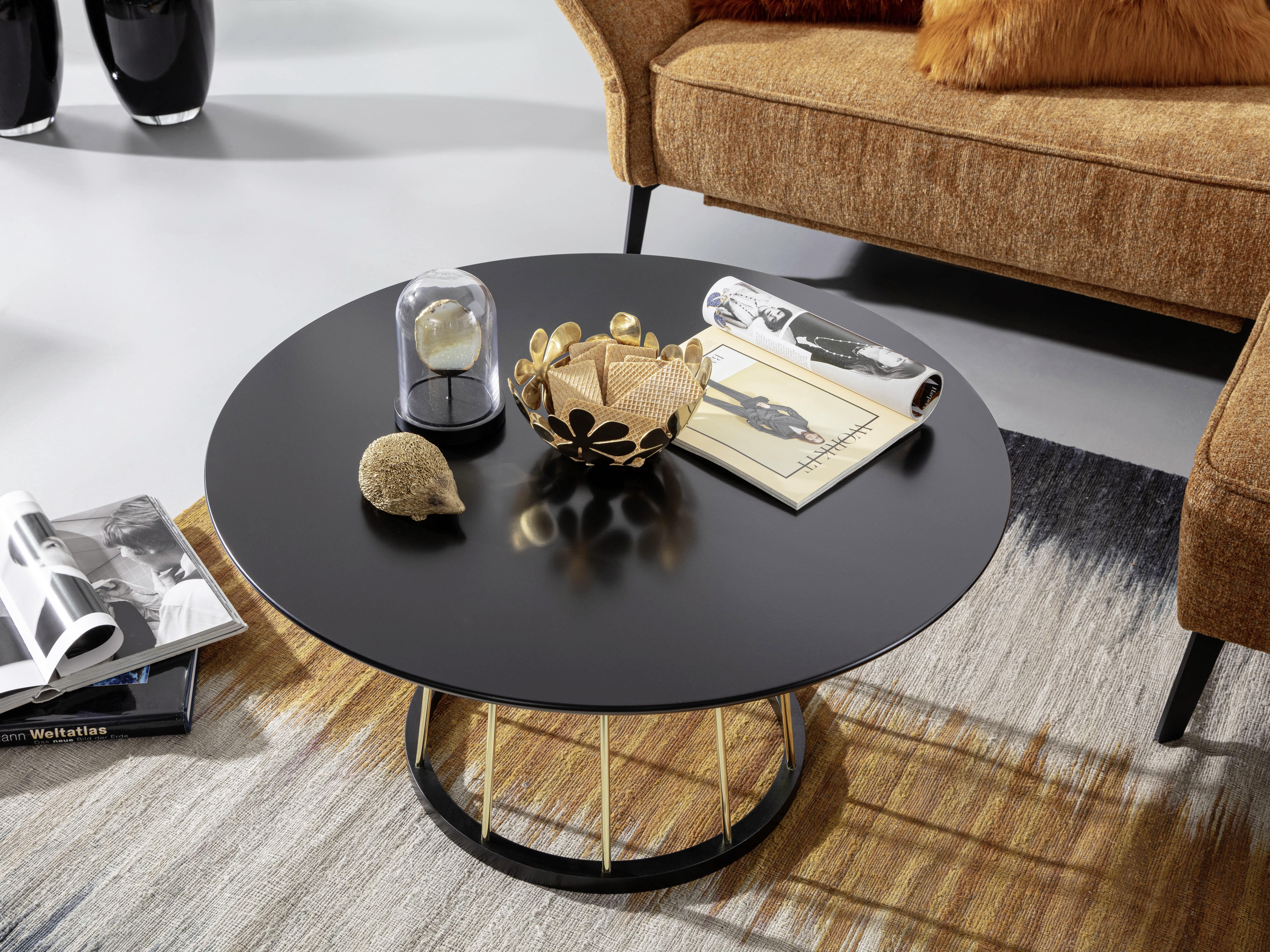 Runder Couchtisch mit goldfarbenem Gestell