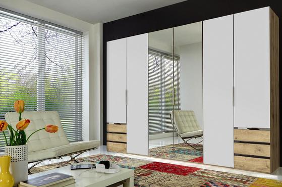Moderne Aufbewahrung mit Gemütlichkeitsfaktor dank des stylischen Kleiderschrankes LEVEL. Sechstüriger Kleiderschrank in Weiß und Eiche Dekor mit Schubladen und Spiegel