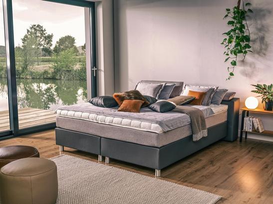 Verstellbares Boxspringbett in Dunkel- und Hellgrau